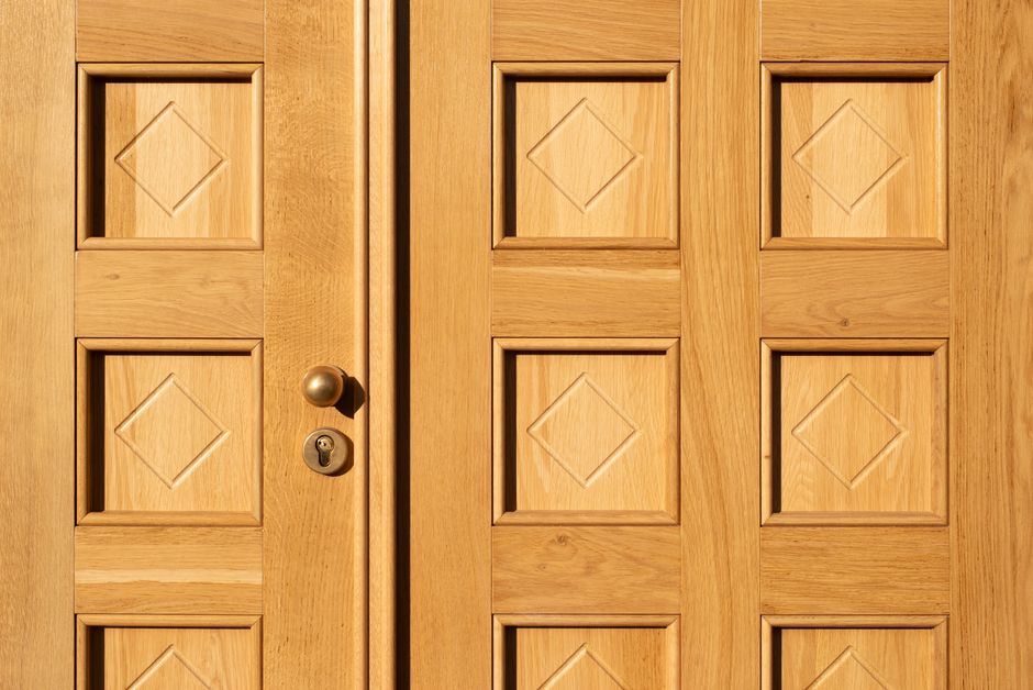 Elegant front door replacement with brass lock